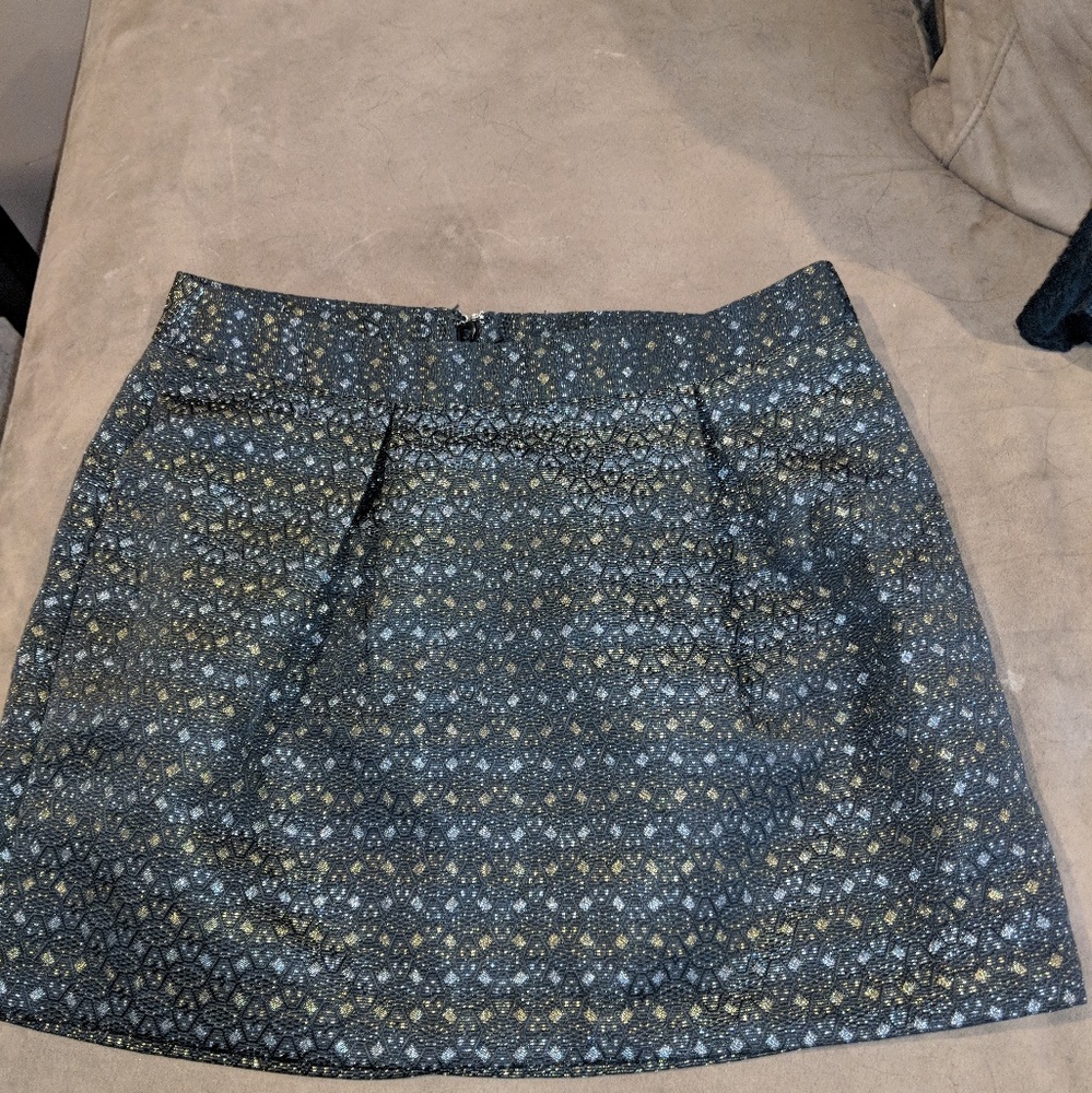 Black pleated shimmery skirt
